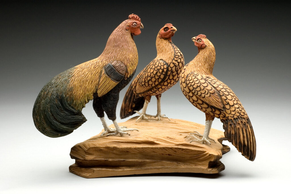 Three Roosters