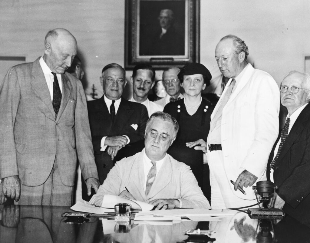 Roosevelt Signs Social Security Act