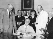 Roosevelt Signs Social Security Act