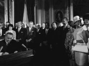Johnson Signs Voting Rights Act