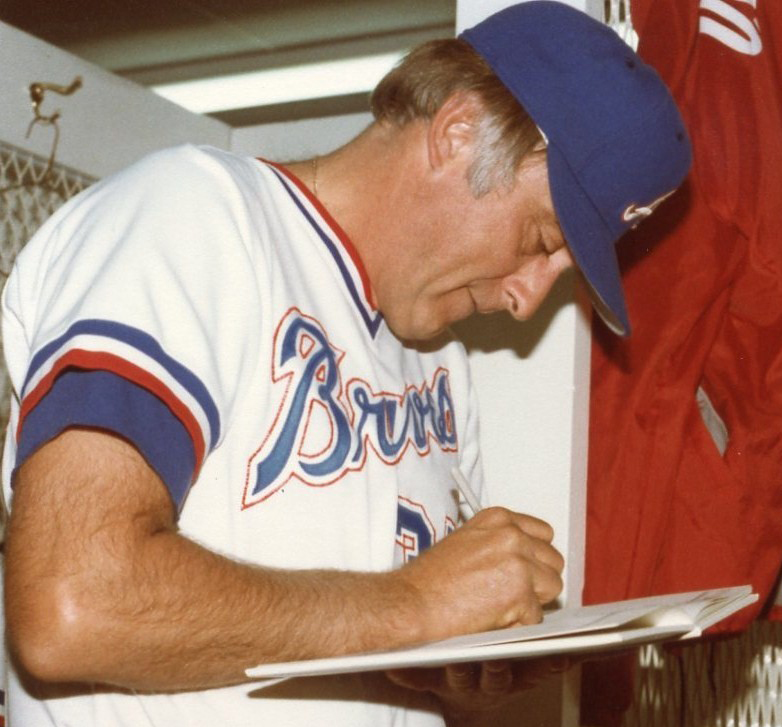 Phil Niekro Signing an Autograph