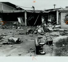 Black and white photograph shows remains of the Gate City Day Nursery after explosion