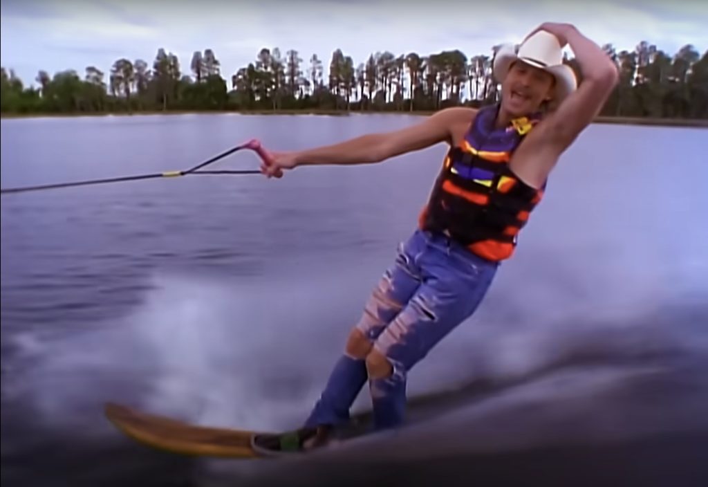 In his music video to his hit song "Chattahoochee," Alan Jackson water skis wearing ripped jeans and a cowboy hat